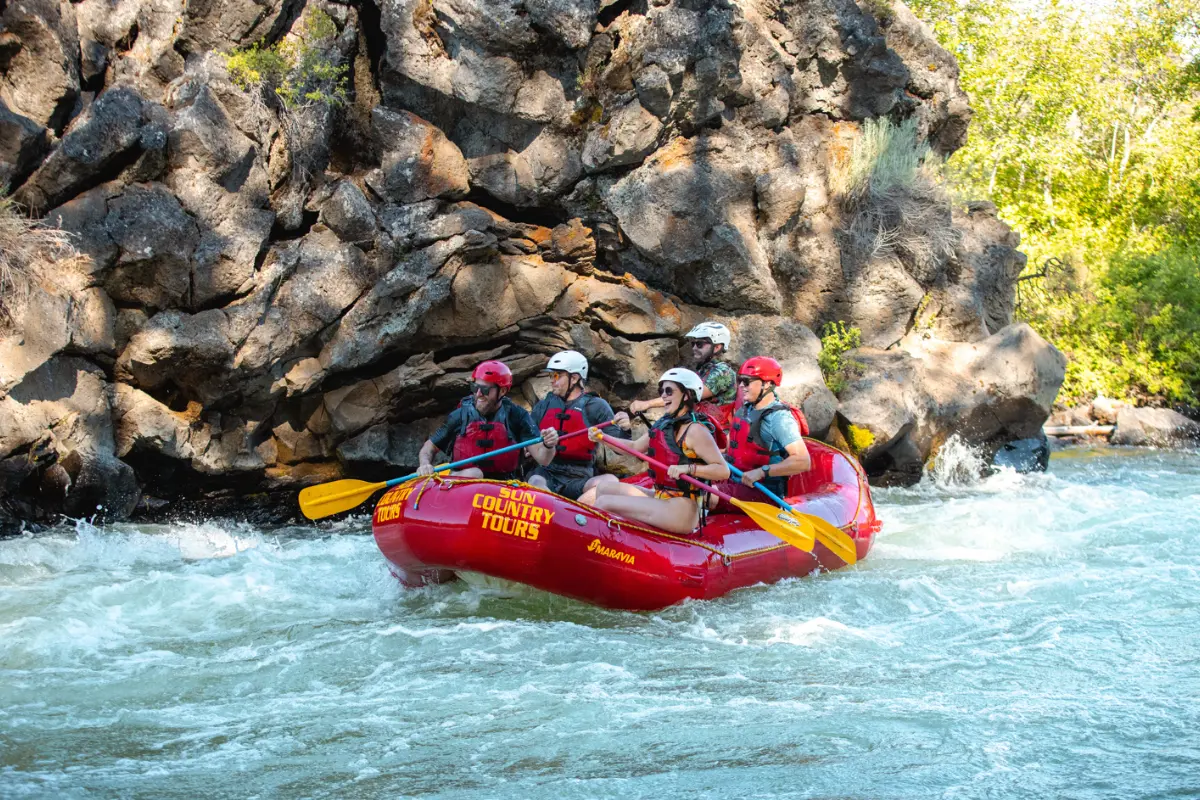 Guide showing group of rafters near Bend Oregon the next set of white water rapids