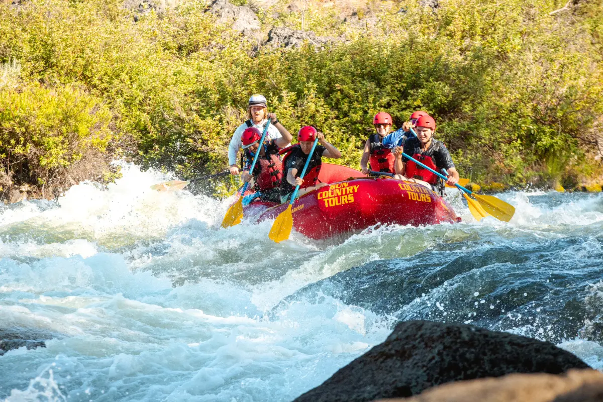 Guide showing group of rafters near Bend Oregon the next set of white water rapids