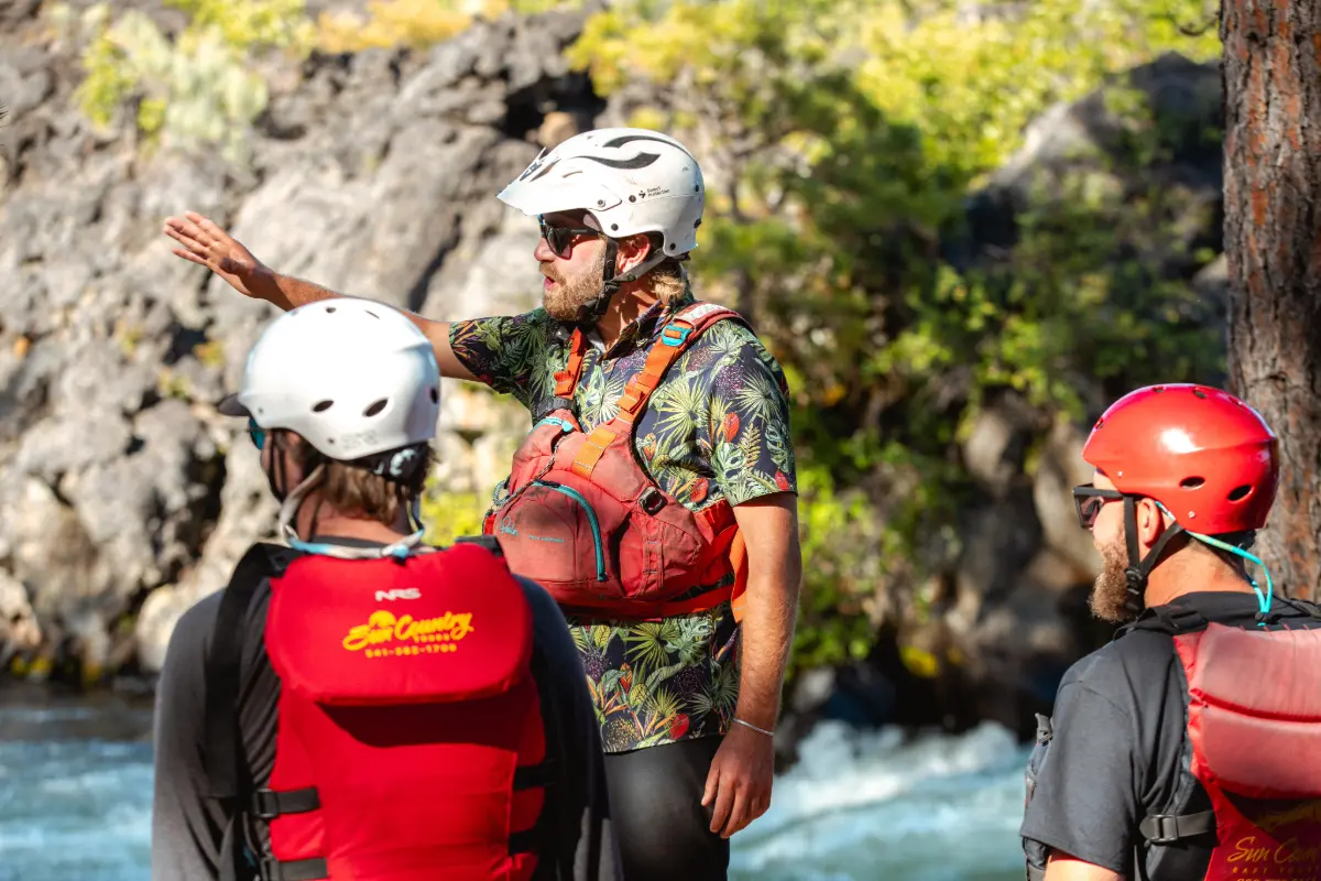 Guide showing group of rafters near Bend Oregon the next set of white water rapids