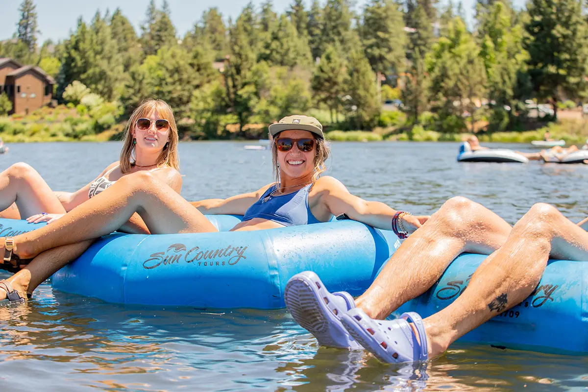 Friends Floating on the Deschutes River in Tube Rented from Sun Country Tours in Bend